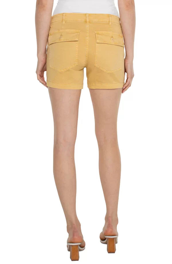 Liverpool Flaxen Gold Shorts showcased from the back, featuring a midrise and trendy coastal style, perfect for summer outfits.