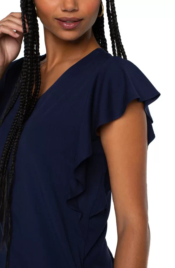 Close-up of LIVERPOOL COSMIC NAVY FLUTTER SLEEVE DRESS from Raggdoll Boutique, showcasing trendy coastal style.