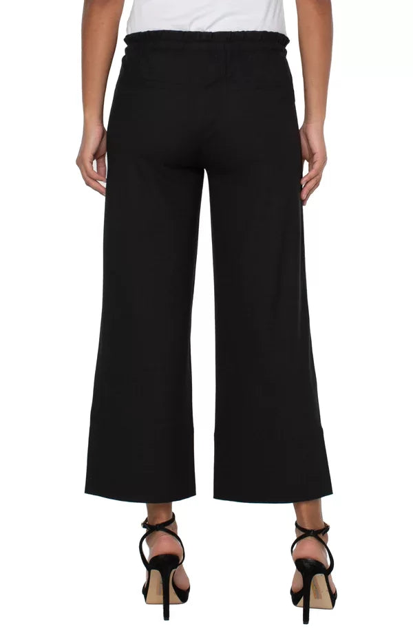 Back view of Liverpool black tie waist pants, perfect for coastal boutique clothing and curvy plus size fashion. Ideal women's bottoms.