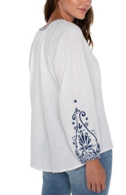 LIVERPOOL OFF WHITE TOP WITH NAVY EMBROIDERED DETAILS worn by model, showcasing trendy coastal style.