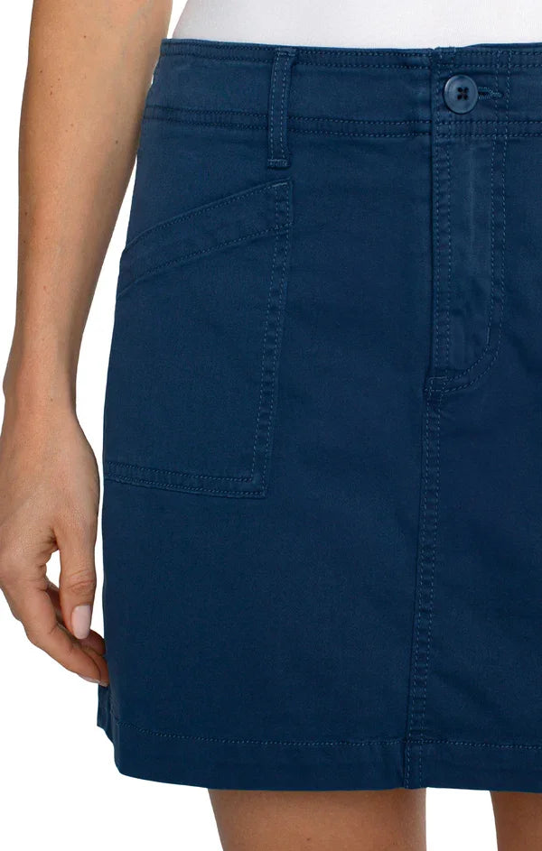 LIVERPOOL CARGO SKORT (INDIGO DUSK) detail showcasing pockets for coastal fashion at Raggdoll Boutique.