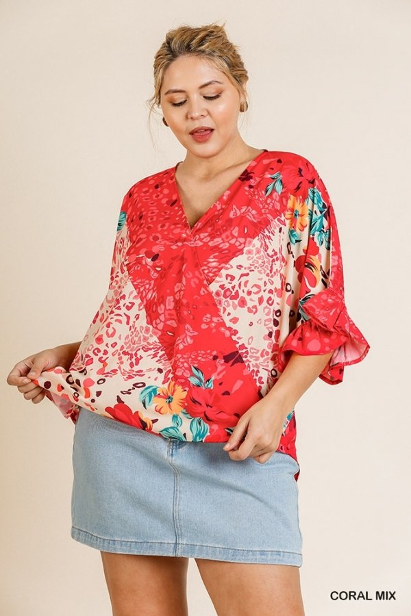 PLUS CORAL MIX UMGEE TOP at Raggdoll Boutique, featuring trendy floral patterns, perfect for summer outfits Texas.