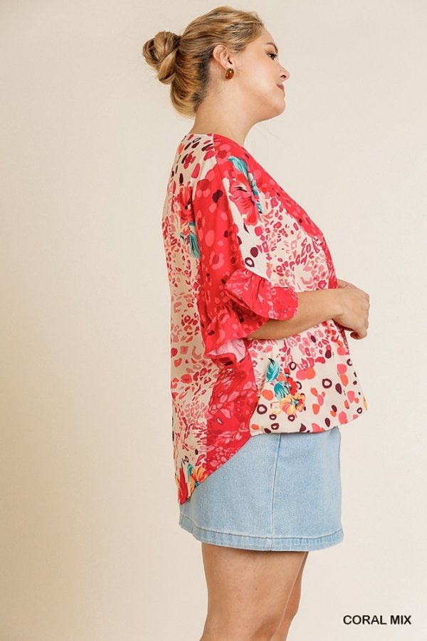 PLUS CORAL MIX UMGEE TOP displayed by model, perfect for trendy coastal style from Raggdoll Boutique.
