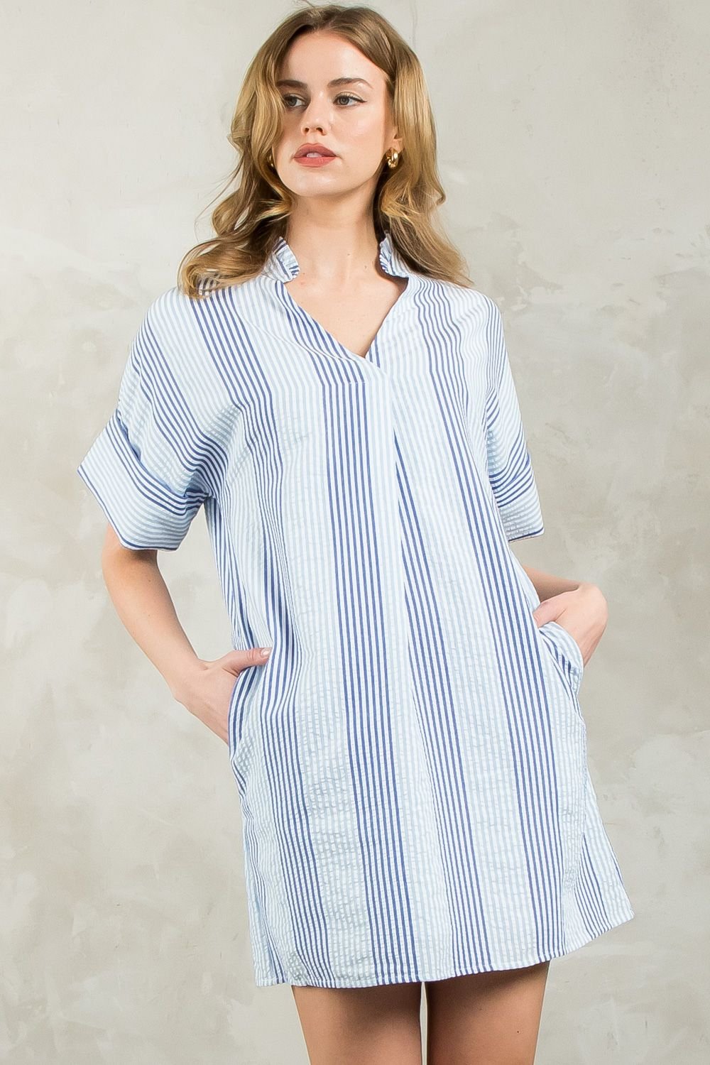 THML Blue Striped Seersucker Dress showcasing trendy coastal style at Raggdoll Boutique in Port Aransas.