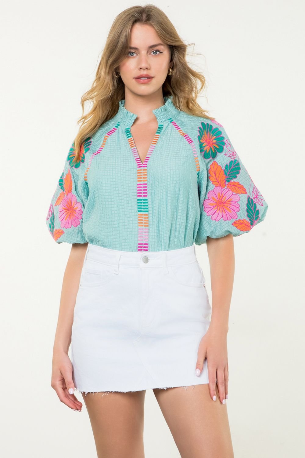 THML Aqua Embroidered Top featured in coastal boutique clothing, paired with a white skirt for a stylish look.