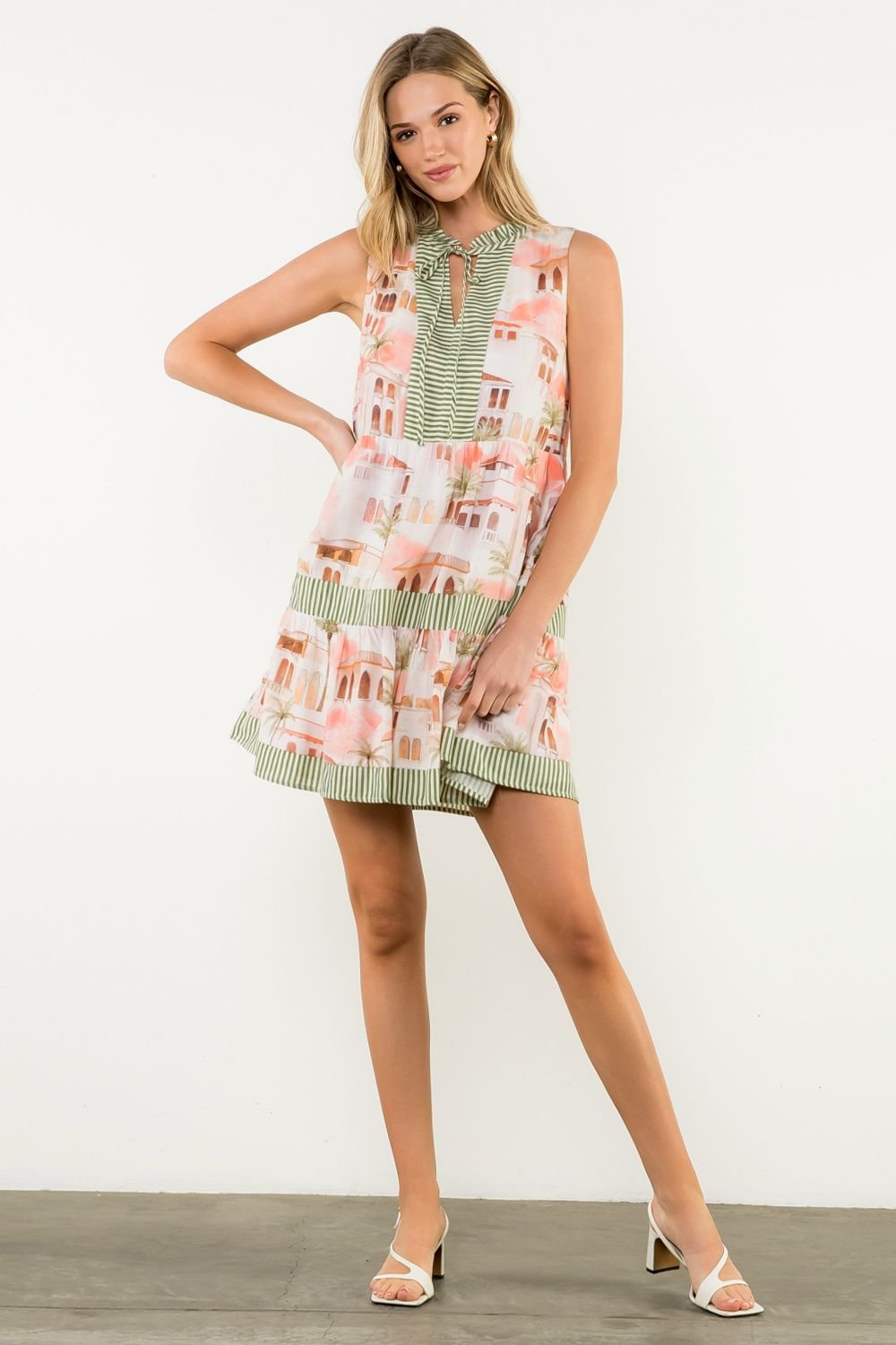 Isla Dress showcasing soft cream and sage with a modern print, perfect for beach outings from a Port Aransas boutique.