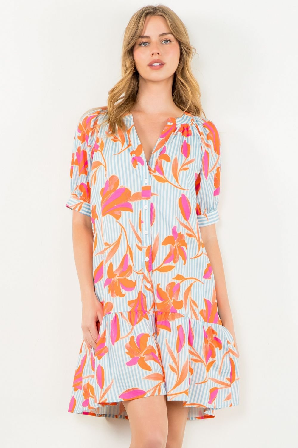 Cameron Dress from Port Aransas boutique, features stripes and bold flowers, ideal for brunch, part of curated women's fashion.