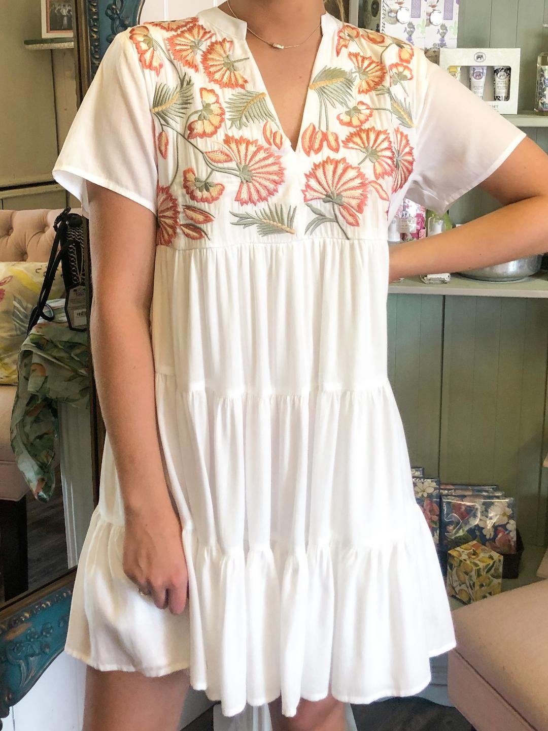 OFF WHITE EMBROIDERED TIERED DRESS from Raggdoll Boutique, perfect for summer outfits in Port Aransas.