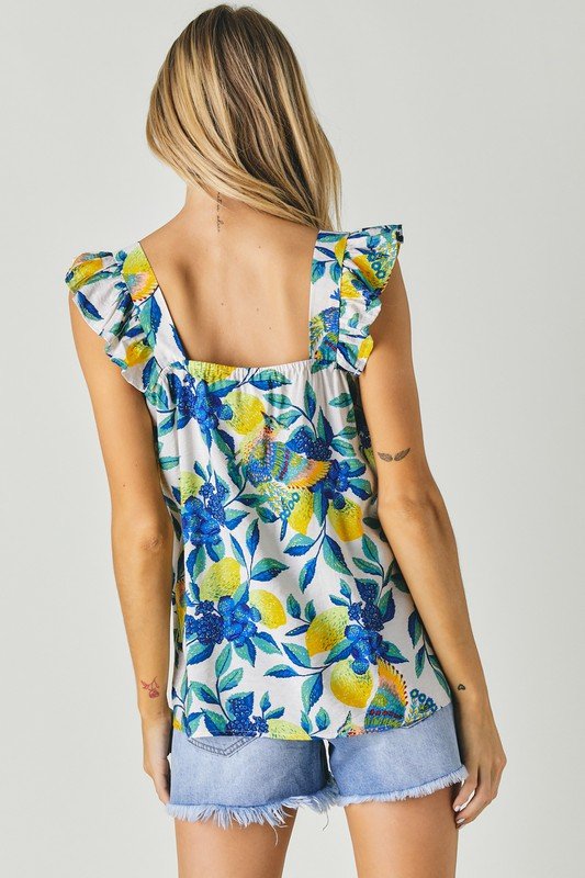 WHITE FLORAL PRINTED SQUARE NECK SLEEVELESS TOP from Raggdoll Boutique, perfect for summer outfits in Port Aransas.
