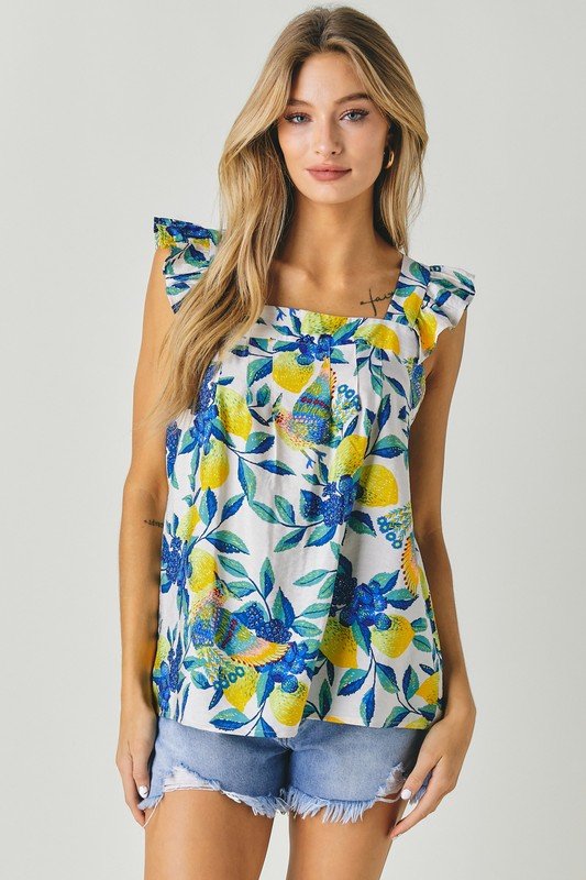 WHITE FLORAL PRINTED SQUARE NECK SLEEVELESS TOP from Raggdoll Boutique, perfect for summer outfits Texas and coastal fashion.