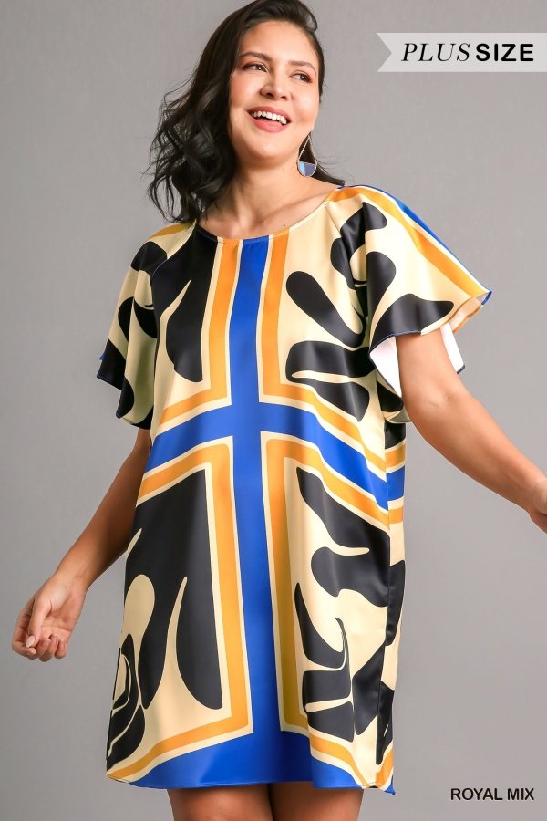Model wearing the ROYAL MIX PLUS DRESS from Raggdoll Boutique, showcasing trendy coastal style and summer outfits Texas.