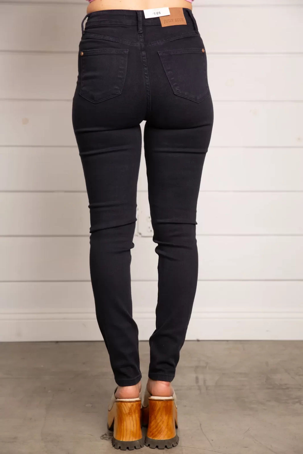 JUDY BLUE HW TUMMY CONTROL SKINNY-NAVY shown from behind, perfect for trendy coastal style at Raggdoll Boutique.